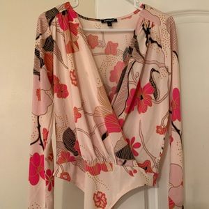 Express women’s floral long sleeve body suit.